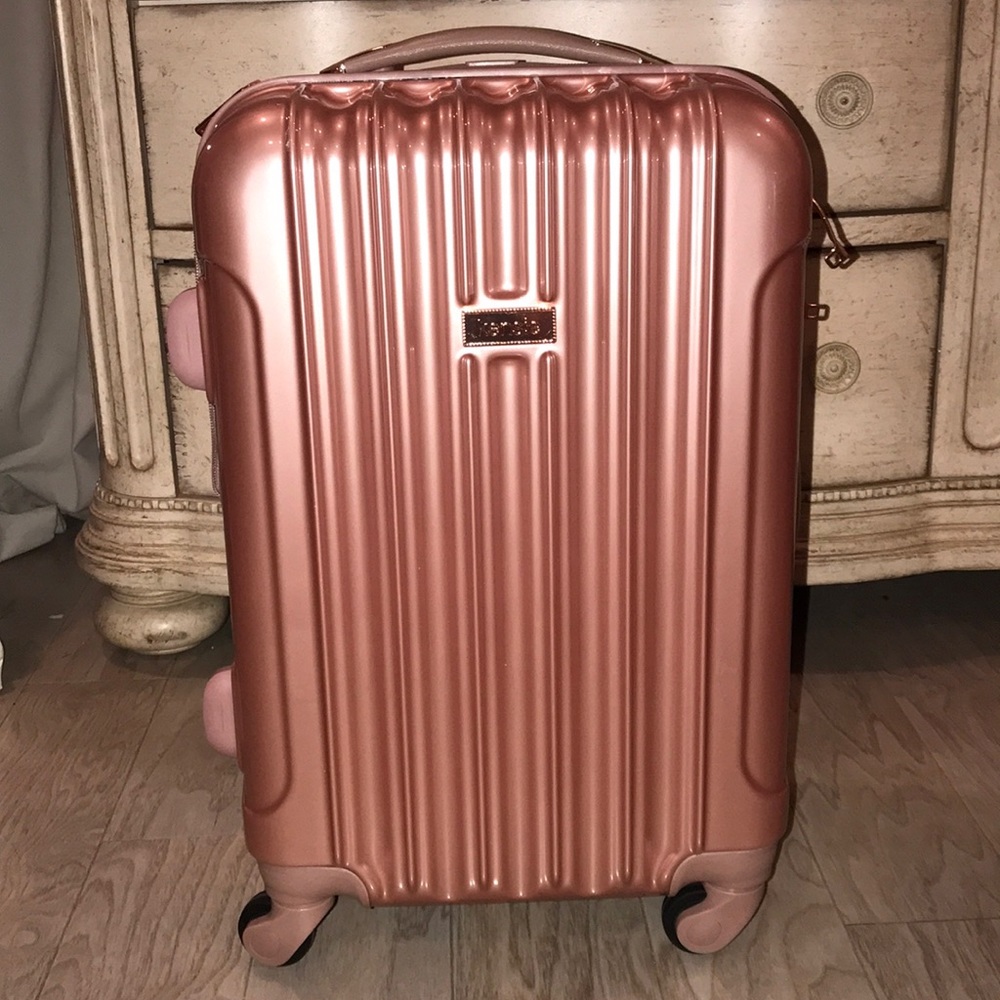 20 inch Kenzie rose gold rolling carry on